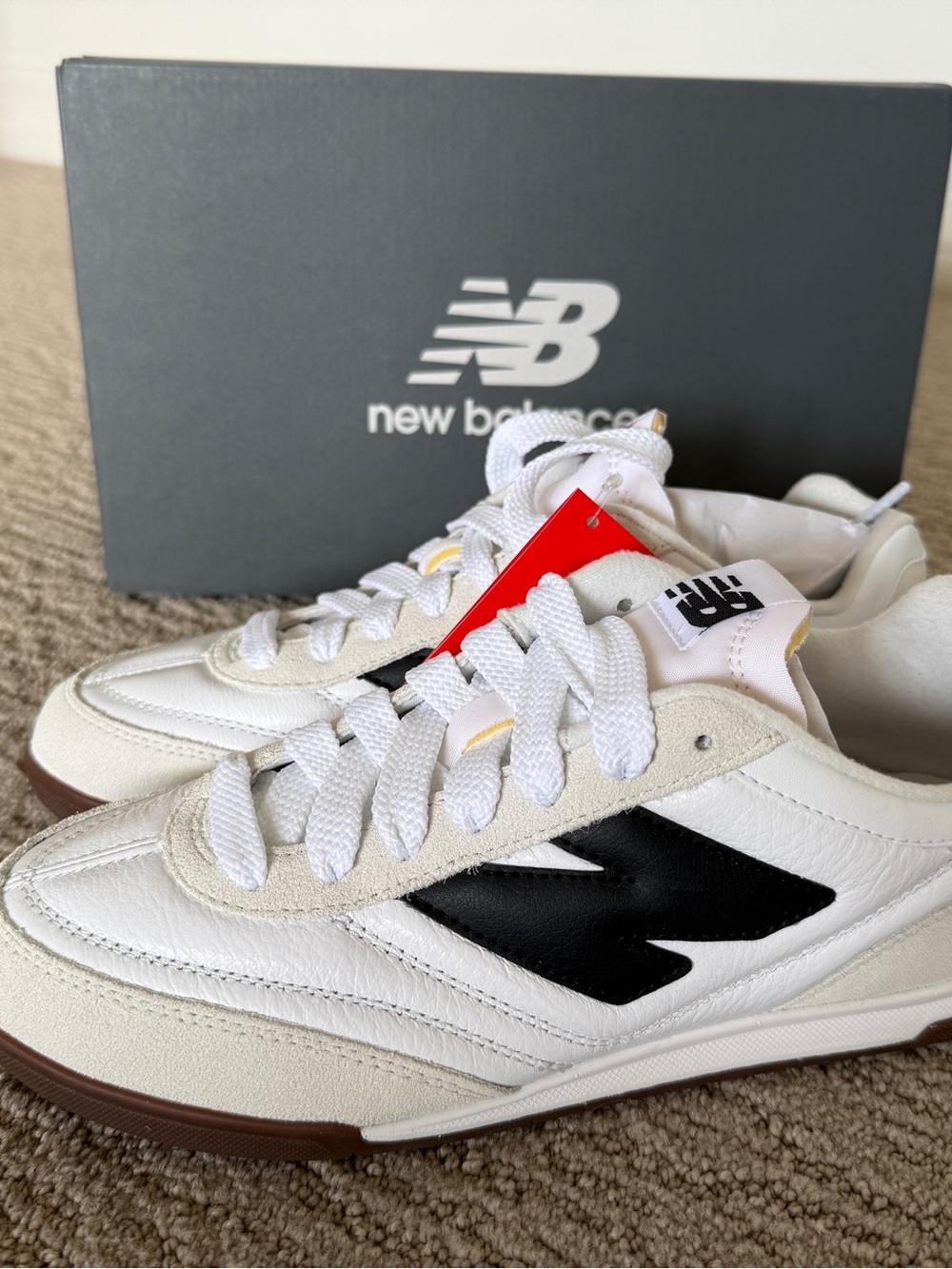 New Balance Men’s White RC42 Refection Sneakers with Black Logo and Brown Sole